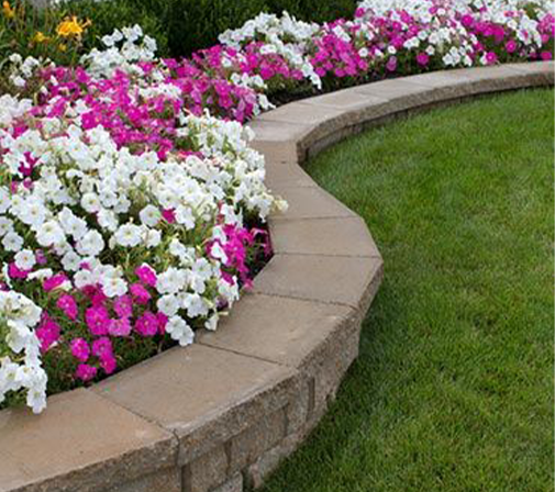 flower-bed-1 flower bed with retaining wall